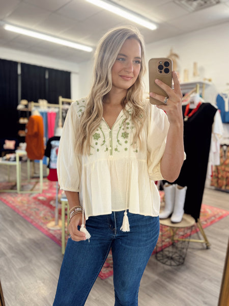 Embroidered Peplum Top