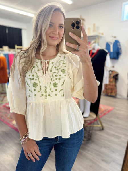 Embroidered Peplum Top